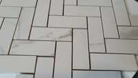 MOZAIC HERRINGBONE ANIMA CALACATTA 2.5X7 (plasa de 26x30 cm) MOZAIC HERRINGBONE ANIMA CALACATTA 2.5X7 (plasa de 26x30 cm)